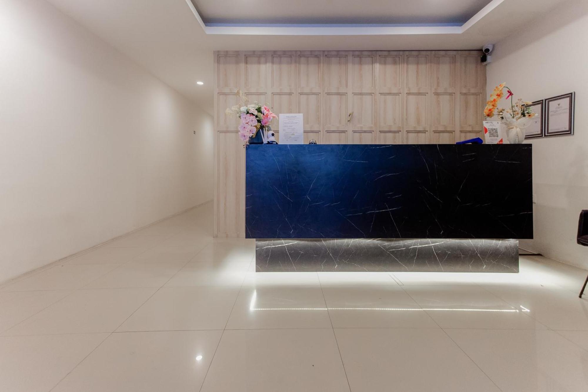 Urbanview Hotel Priority Samarinda By Reddoorz Buitenkant foto